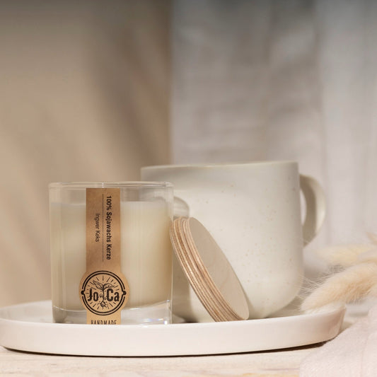 Candledust room fragrance with warm candlelight in a calm interior