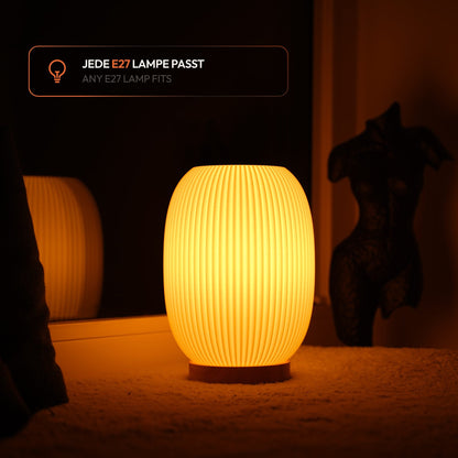 Boa Tischlampe als warmes Stimmungslicht für ruhige Wohnbereiche