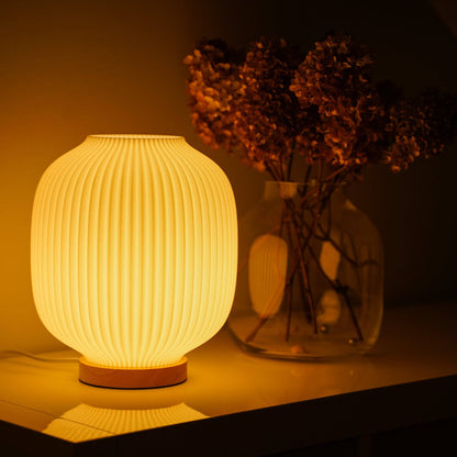Puro Lampe mit warmem Licht als stilvolle Tischlampe für Atmosphäre, Rituale und bewusste Raumgestaltung