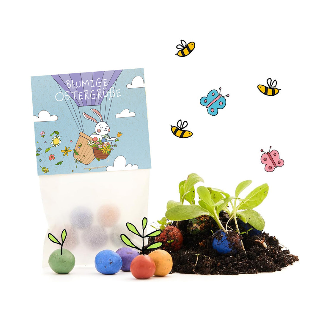 Blumige Ostergrüße – 10 Tütchen mit 50 Saatkugeln – Verpackung und Produkt im Freisteller
