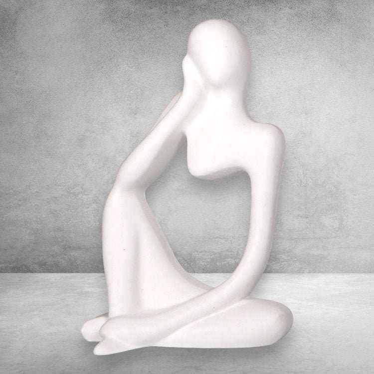 Figur einer nachdenklichen Frau – stilvolle Deko mit Ausdruck