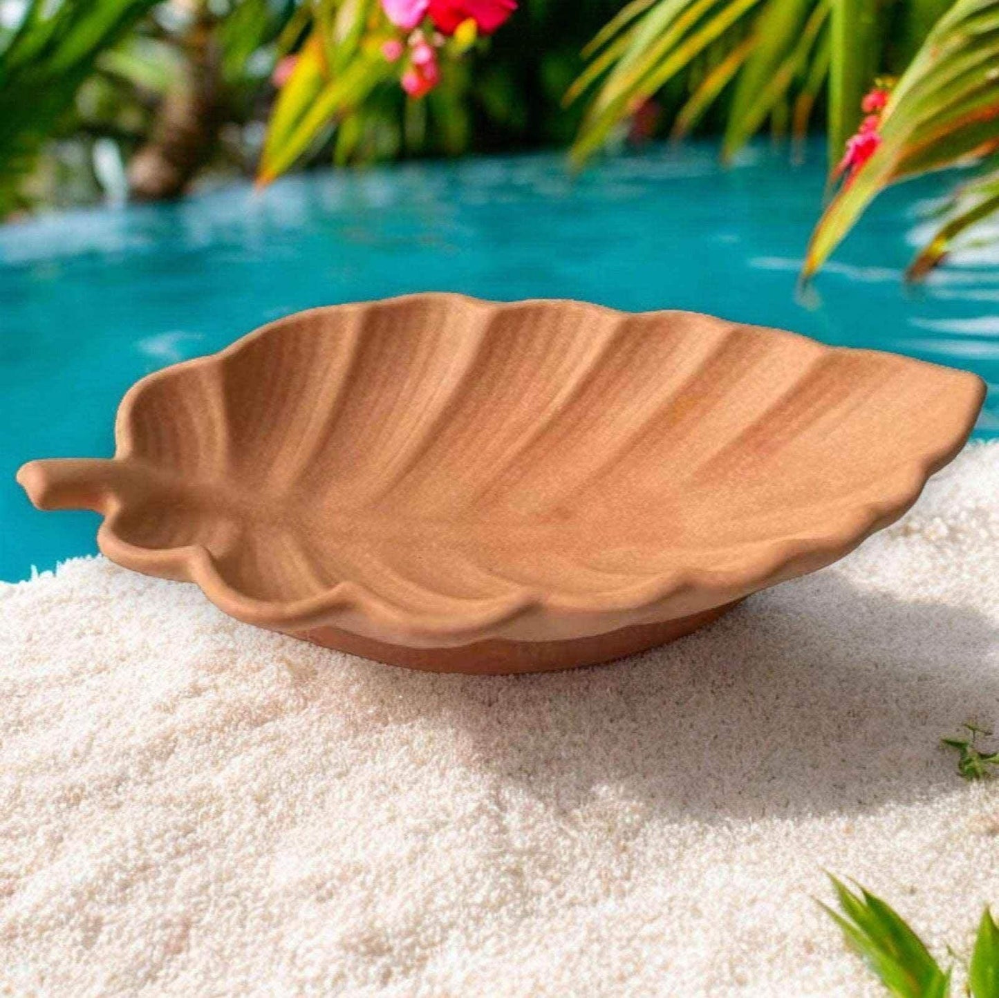 Braune Schmuckschale in Muschelform aus SteinKunstWerk als dekorative Ablage für Schmuck und kleine Gegenstände am Pool